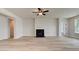 Spacious living room featuring hardwood floors and a fireplace at 508 Dolce Rd, Locust Grove, GA 30248