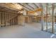 Unfinished basement with framed walls and exposed beams at 508 Dolce Rd, Locust Grove, GA 30248