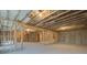 Unfinished basement with framed walls and exposed beams at 508 Dolce Rd, Locust Grove, GA 30248