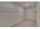 Large walk-in closet with wire shelving at 203 Arabella Pkwy, Locust Grove, GA 30248