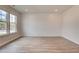 Home office with hardwood floors and shiplap accent wall at 203 Arabella Pkwy, Locust Grove, GA 30248