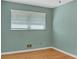 Bedroom with hardwood floors and neutral colored walls at 2289 Montrose Dr, East Point, GA 30344