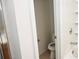 Small bathroom with toilet and shower at 2374 Suwanee Pointe Dr, Lawrenceville, GA 30043