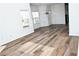 Dining room with hardwood floor and lots of natural light at 2374 Suwanee Pointe Dr, Lawrenceville, GA 30043