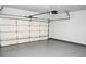 Spacious garage with automatic door opener and epoxy floor at 2374 Suwanee Pointe Dr, Lawrenceville, GA 30043