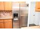 Stainless steel refrigerator in kitchen at 2374 Suwanee Pointe Dr, Lawrenceville, GA 30043