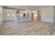 Modern kitchen with white cabinets and large island at 443 Lothbury Ave, Locust Grove, GA 30248