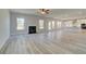 Bright living room with fireplace and hardwood floors at 443 Lothbury Ave, Locust Grove, GA 30248