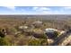 Expansive aerial view of unique circular buildings surrounded by lush greenery and trees at 821 Ralph Mcgill Ne Blvd # 3216, Atlanta, GA 30306