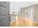 Inviting entryway featuring hardwood floors and a neutral color palette leading into the spacious living area at 821 Ralph Mcgill Ne Blvd # 3216, Atlanta, GA 30306