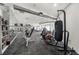 Bright gym room equipped with weight machines, mirrors and punching bag at 821 Ralph Mcgill Ne Blvd # 3216, Atlanta, GA 30306