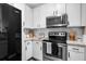 Modern kitchen with stainless steel appliances, ample counter space, and clean white cabinetry at 821 Ralph Mcgill Ne Blvd # 3216, Atlanta, GA 30306
