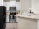 Well-appointed kitchen featuring sleek stainless steel appliances and modern fixtures at 821 Ralph Mcgill Ne Blvd # 3216, Atlanta, GA 30306