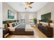 Well-furnished main bedroom with hardwood floors, multiple windows, and tasteful decor at 821 Ralph Mcgill Ne Blvd # 3216, Atlanta, GA 30306