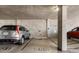 Assigned parking spot in a well-lit garage featuring concrete block walls, numbered spaces, and easy access at 821 Ralph Mcgill Ne Blvd # 3216, Atlanta, GA 30306