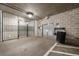 Secured mailroom in a parking garage featuring gated access, mailboxes, and an exit at 821 Ralph Mcgill Ne Blvd # 3216, Atlanta, GA 30306