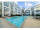 Community pool with surrounding lounge chairs at 821 Ralph Mcgill Ne Blvd # 3216, Atlanta, GA 30306