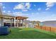 Backyard with pergola, patio, and fenced yard at 100 Orchard Ln, Covington, GA 30014
