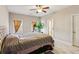 Large bedroom with a king-size bed and en-suite bathroom at 100 Orchard Ln, Covington, GA 30014