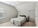Cozy bedroom with a queen-size bed and neutral decor at 100 Orchard Ln, Covington, GA 30014