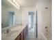 Bathroom with double vanity, tile floor, and shower/tub combo at 286 Heathridge Se Ln, Mableton, GA 30126