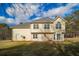 Two-story house with backyard patio and grassy yard at 286 Heathridge Se Ln, Mableton, GA 30126