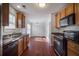 Kitchen with stainless steel appliances and wood cabinets at 286 Heathridge Se Ln, Mableton, GA 30126