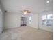 Bright and spacious living room with neutral carpeting at 286 Heathridge Se Ln, Mableton, GA 30126