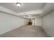 Spacious finished basement with neutral carpet at 3955 Three Chimneys Ln, Cumming, GA 30041