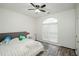 Large bedroom with wood flooring and window at 3955 Three Chimneys Ln, Cumming, GA 30041