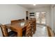 Basement dining area with large table and access to backyard at 3955 Three Chimneys Ln, Cumming, GA 30041