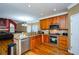 Kitchen with granite countertops and stainless steel appliances at 3955 Three Chimneys Ln, Cumming, GA 30041