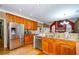 Kitchen with stainless steel appliances and granite countertops at 3955 Three Chimneys Ln, Cumming, GA 30041