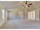 Large main bedroom with ceiling fan and access to other rooms at 604 Amabile Rd, Locust Grove, GA 30248