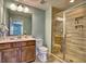 Full bathroom with vanity, toilet, and a walk-in shower at 124 Sweetbriar Farm Rd, Woodstock, GA 30188