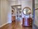 Bright entryway with hardwood floors and antique furniture at 124 Sweetbriar Farm Rd, Woodstock, GA 30188