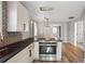 Modern kitchen with an island and stainless steel appliances at 1534 Alma Sw St, Atlanta, GA 30311