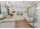 Modern bathroom with double vanity and soaking tub at 1750 Derry Sw Ave, Atlanta, GA 30310