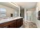 Modern bathroom with double vanity, a shower, and a bathtub at 3720 Liverpool Way, Atlanta, GA 30331