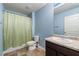 Clean bathroom with shower/tub combo, toilet and vanity at 3720 Liverpool Way, Atlanta, GA 30331