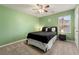Bright bedroom with a full-size bed and light green walls at 3720 Liverpool Way, Atlanta, GA 30331