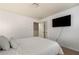 Cozy bedroom with a queen-size bed and a large TV at 3720 Liverpool Way, Atlanta, GA 30331