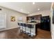 Modern kitchen with island, granite countertops, and breakfast bar at 3720 Liverpool Way, Atlanta, GA 30331