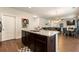 Kitchen island with granite countertops and breakfast bar seating at 3720 Liverpool Way, Atlanta, GA 30331