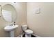 Clean powder room with pedestal sink and toilet at 3720 Liverpool Way, Atlanta, GA 30331