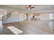 Open-concept living room boasts hardwood floors, recessed lighting and seamless flow to the kitchen at 501 Dolce Rd, Locust Grove, GA 30248