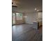 Open-concept living area with bright windows and a door to the outdoor, showcasing modern fixtures and finishes at 1070 Crest Mill Dr, Marietta, GA 30008