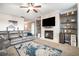 Spacious living room with fireplace and built-in shelving at 1122 Cotton Oak Dr, Lawrenceville, GA 30045