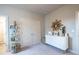 Charming bedroom with a white dresser, closet, and decorative accents at 2760 Rustic Lake Ter, Cumming, GA 30041