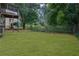 Large backyard with fenced perimeter at 4913 Windsor Downs Dr, Decatur, GA 30035